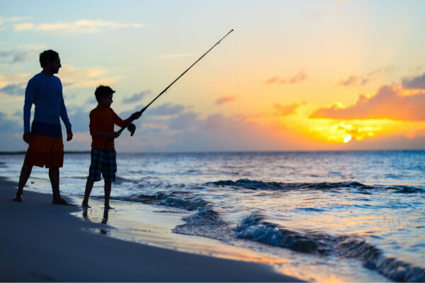 Dad fishing with his son on the outer banks
